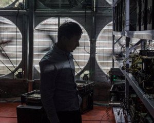 High-efficiency bitcoin mining rig hardware awaiting maintenance in mining farm
