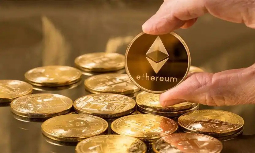 Ethereum logo in front of a motherboard, hinting at the merge and its impact on mining hardware
